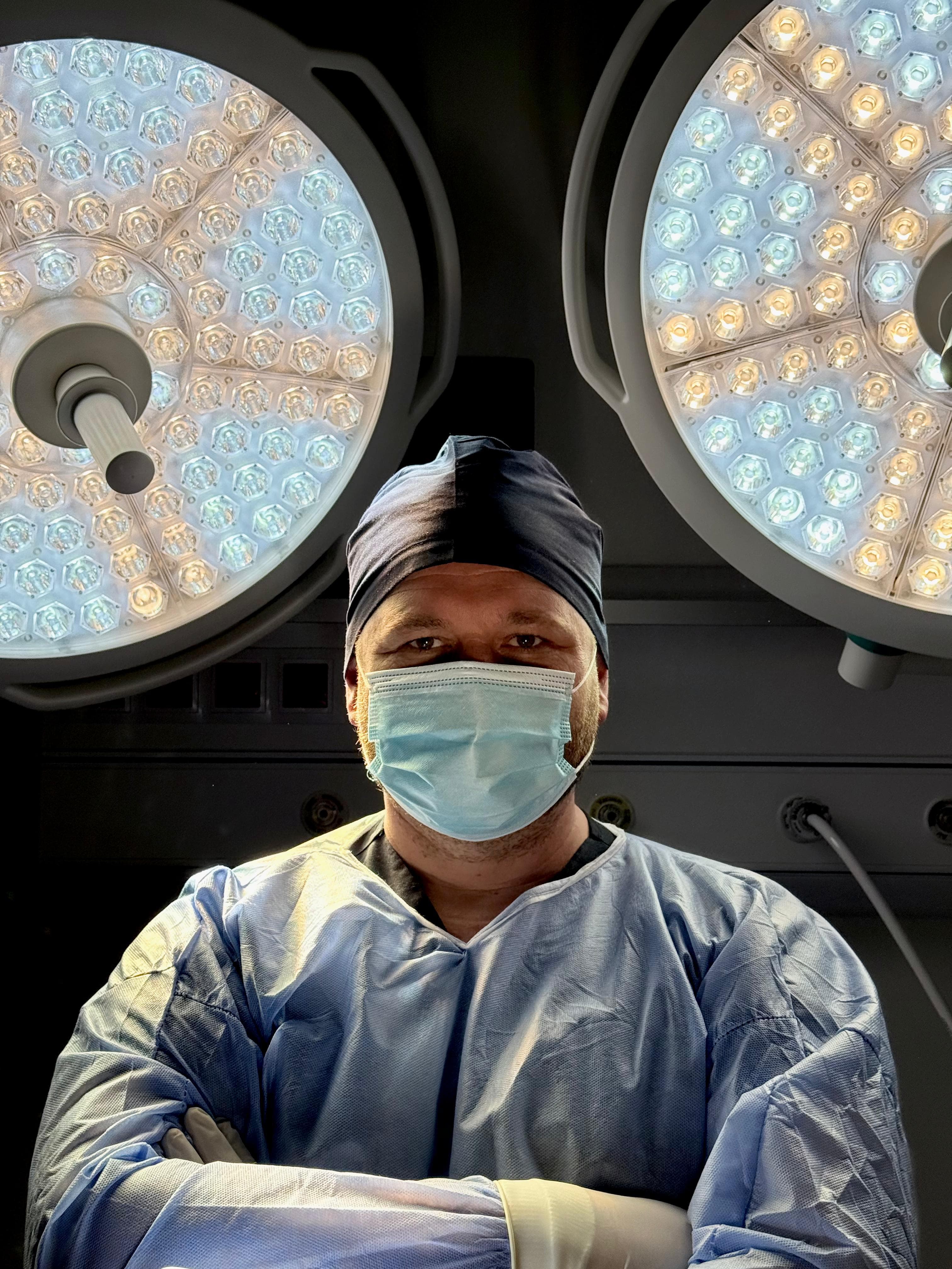 Komi Dental Center doctor in surgical attire